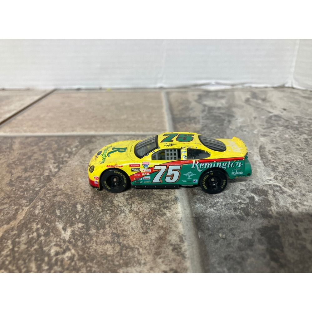 Johnny Lightning 175 Remington Taurus Stock Car Yellow Green 164 Scale